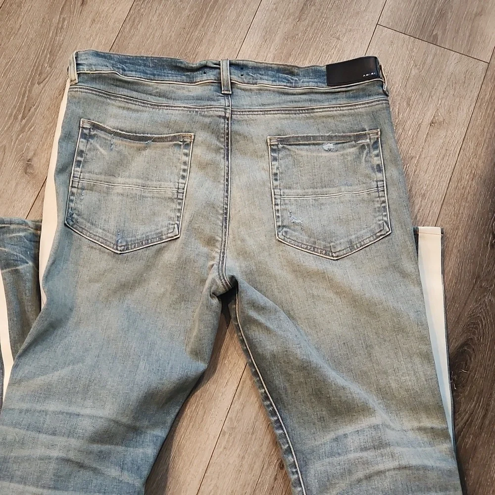 AMIRI Blue and White Skinny Jeans with Distressed Details